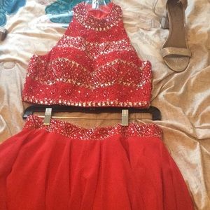 Selling a two piece red dress with glittery hills